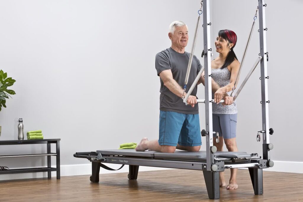 Allegro Tower of Power Pilates aprīkojums lietošanā