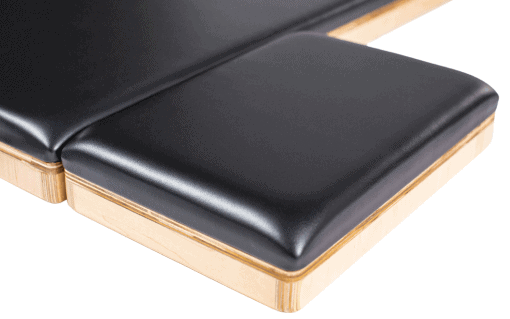 Pilates equipment with ergonomic handles and footstrap for versatility.