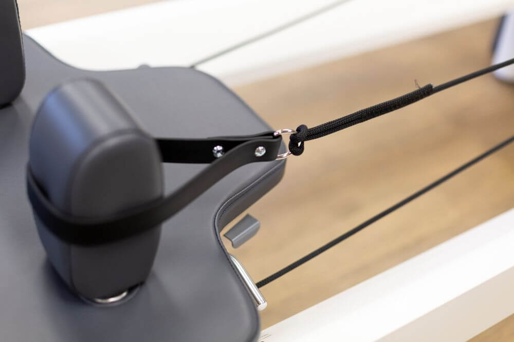 EZClean cilpas uz Balanced Body trenažiera, daļēji spīdīga apdare