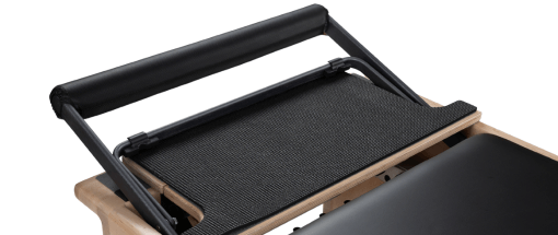 High-quality maple Pilates platform with non-skid cover and foam pad.