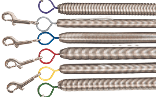 Variety of Pilates spring resistances: yellow, grey, blue, red, green, black