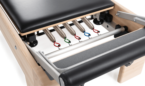 Classic Footbar un No-Roll Springbar uz Balanced Body Reformer