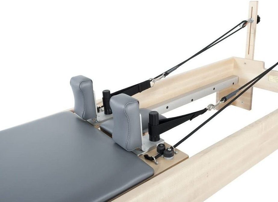 Pilates Reformer kustīgā platforma ar TwistLock plecu balstiem.